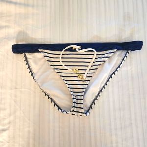Sailor bikini bottoms with gold anchor ties.
